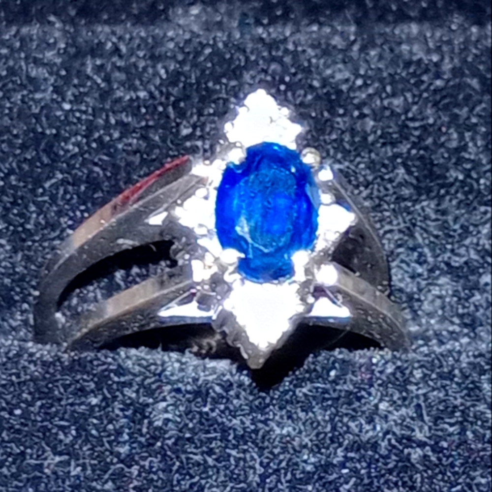 14k Revere ring with diamonds on one side and sapphire & diamonds on other side